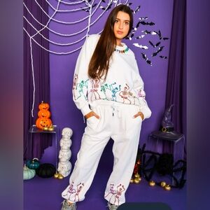 QUEEN OF SPARKLES White Pants with Colorful Skeleton Design